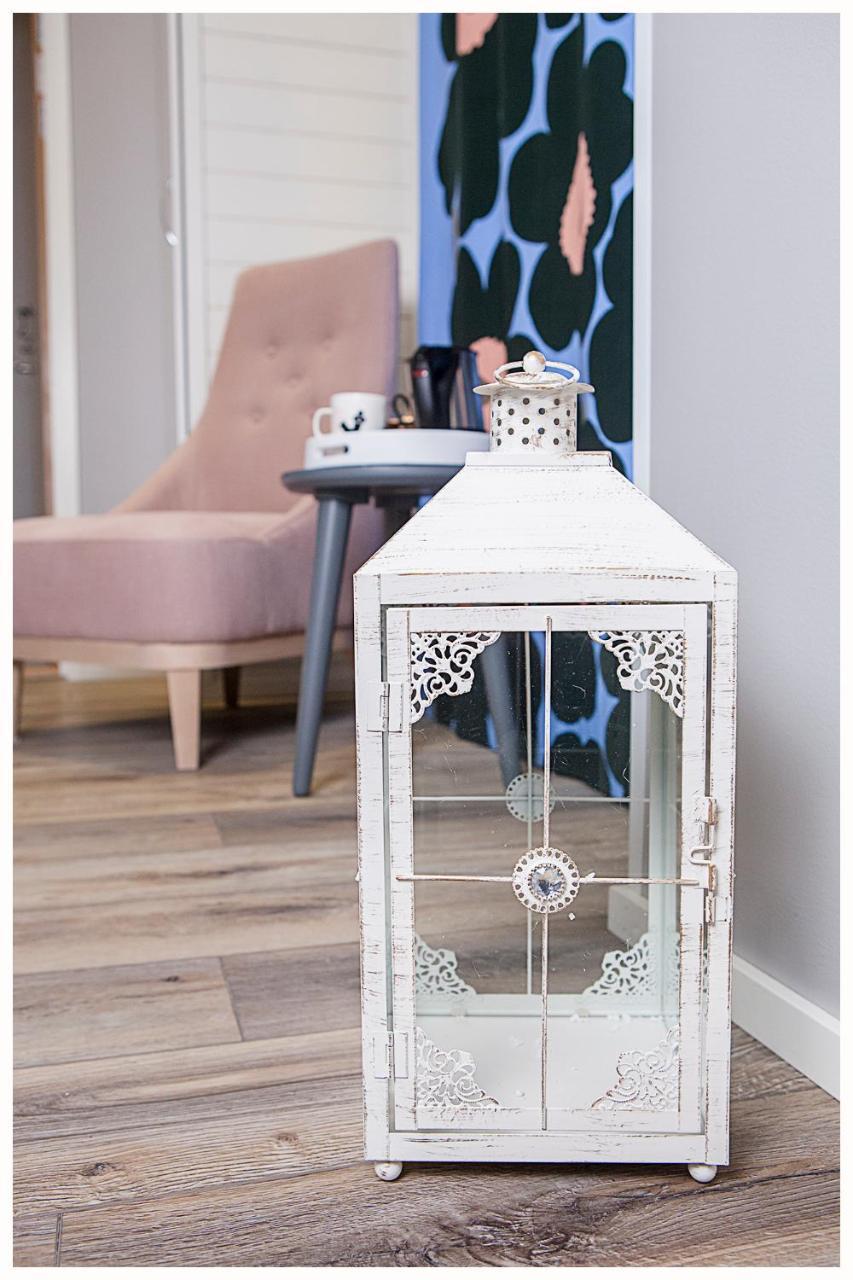 Crystal Arctic Suites Rovaniemi Exterior photo A white lantern