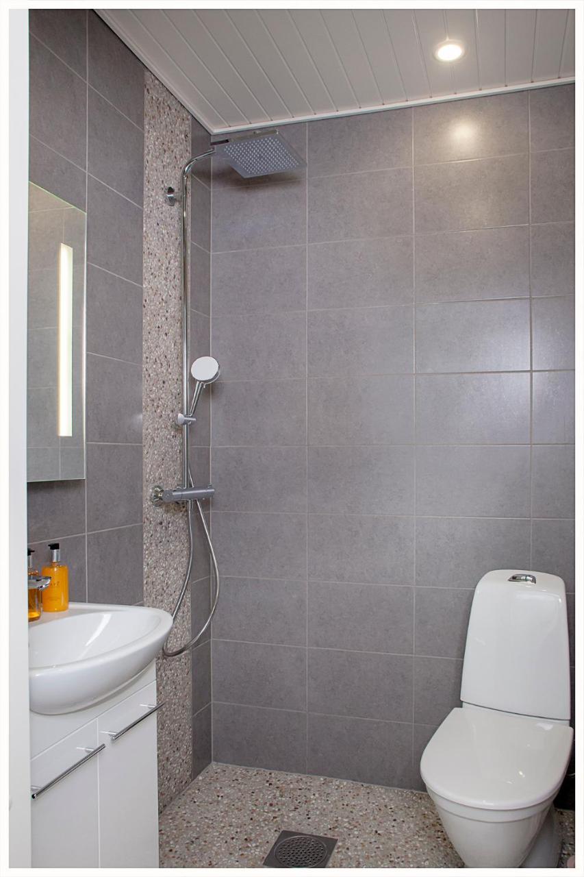 Crystal Arctic Suites Rovaniemi Exterior photo Bathroom with shower