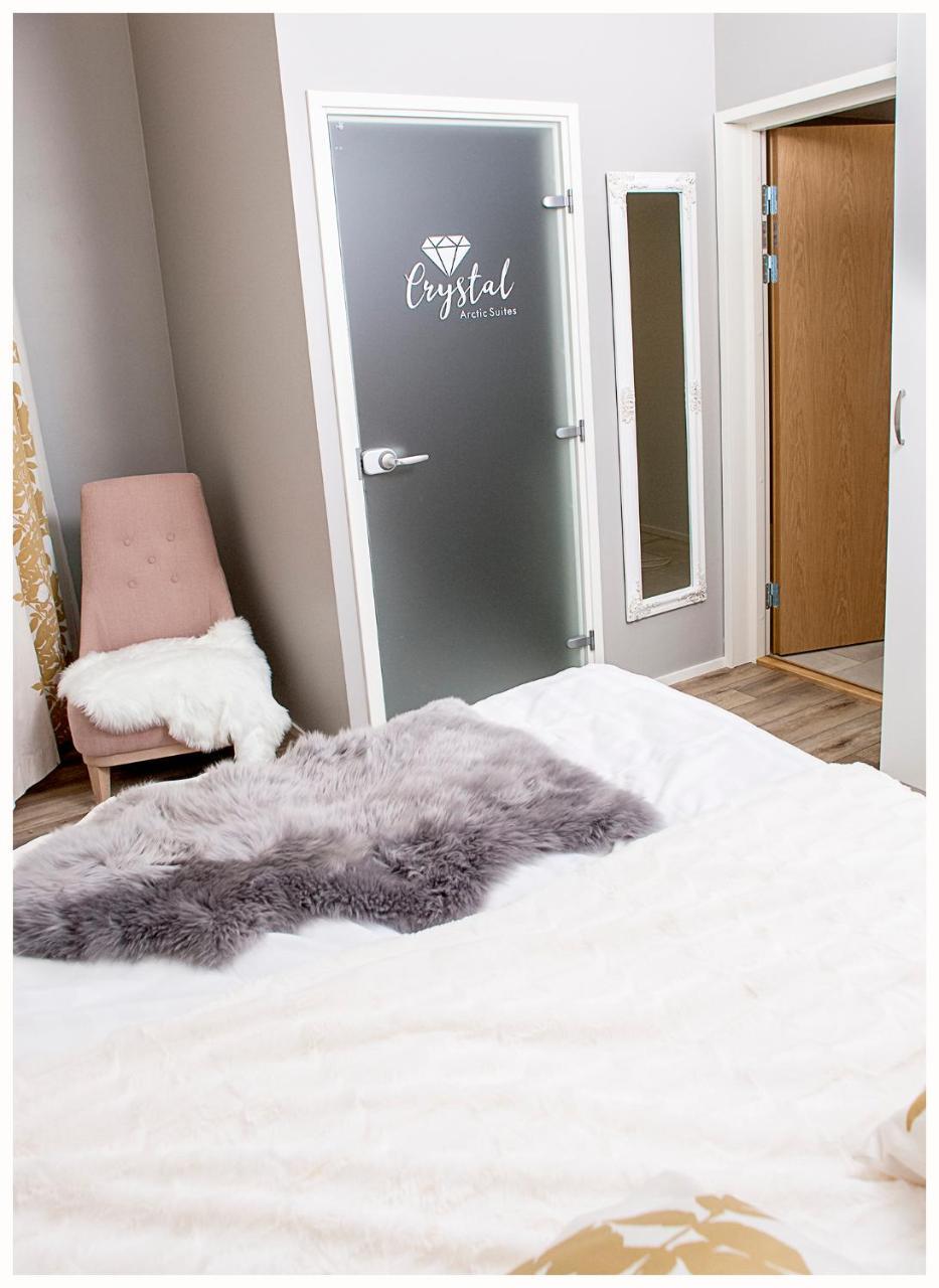Crystal Arctic Suites Rovaniemi Exterior photo A sheepskin rug